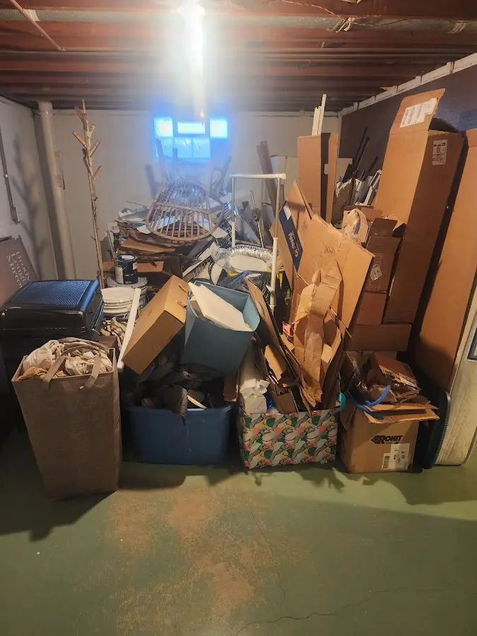 Roll-off dumpster container at job site for 6 Yard Dumpster Rental in Glenmont